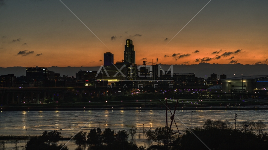 A view over the river toward the skyline at twilight, Downtown Omaha, Nebraska Aerial Stock Photo DXP002_173_0001 | Axiom Images