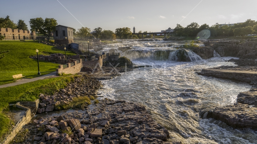 A view of the waterfalls at sunset in Sioux Falls, South Dakota Aerial Stock Photo DXP002_176_0006 | Axiom Images