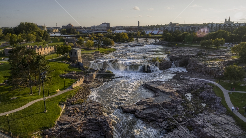 A view of Big Sioux River waterfalls at sunset in Sioux Falls, South Dakota Aerial Stock Photo DXP002_176_0010 | Axiom Images