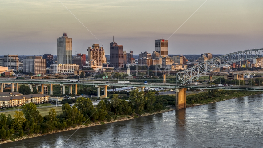 The city's skyline behind the bridge at sunset, Downtown Memphis, Tennessee Aerial Stock Photo DXP002_181_0002 | Axiom Images