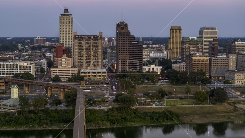 Apartment and office high-rises at sunset in Downtown Memphis, Tennessee Aerial Stock Photo DXP002_181_0004 | Axiom Images