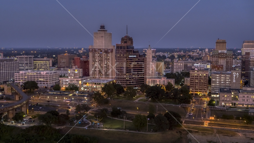 Office high-rises at twilight in Downtown Memphis, Tennessee Aerial Stock Photo DXP002_182_0001 | Axiom Images
