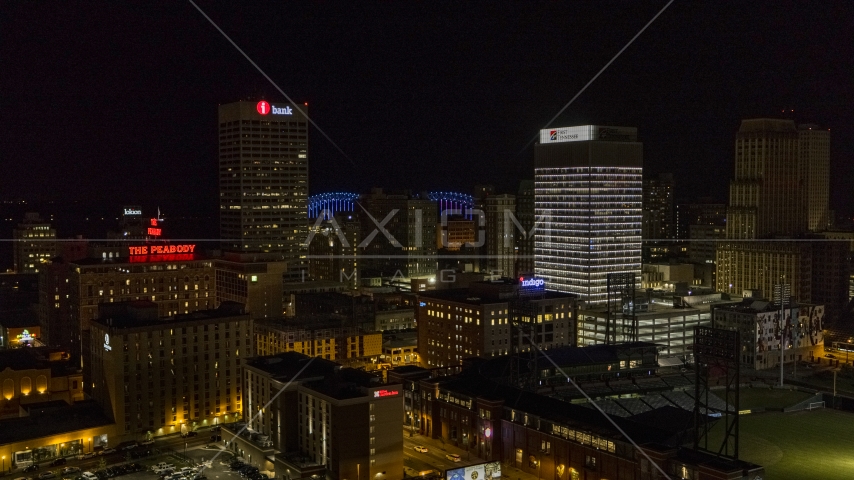 One Commerce Square and First Tennessee Building office towers at night in Downtown Memphis, Tennessee Aerial Stock Photo DXP002_182_0002 | Axiom Images