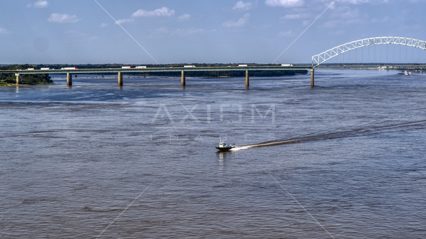 A boat racing across the Mississippi River, Memphis, Tennessee Aerial Stock Photo DXP002_183_0005 | Axiom Images