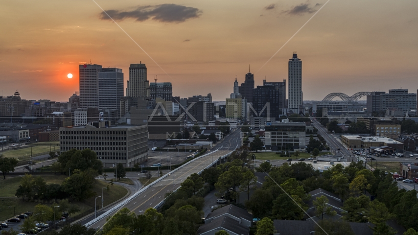 A view of the downtown skyline and the setting sun, Downtown Memphis, Tennessee Aerial Stock Photo DXP002_186_0004 | Axiom Images
