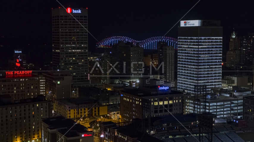 City buildings between office towers at nighttime, Downtown Memphis, Tennessee Aerial Stock Photo DXP002_188_0003 | Axiom Images