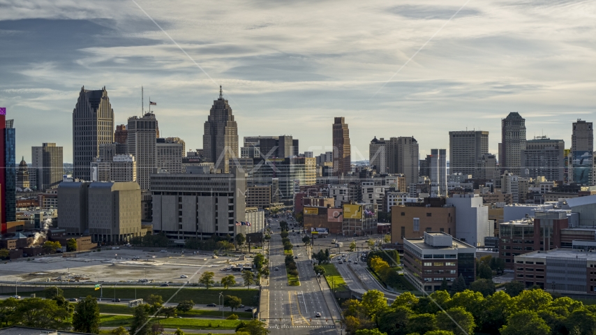 The city skyline seen from Gratiot Avenue at sunset in Downtown Detroit, Michigan Aerial Stock Photo DXP002_192_0001 | Axiom Images