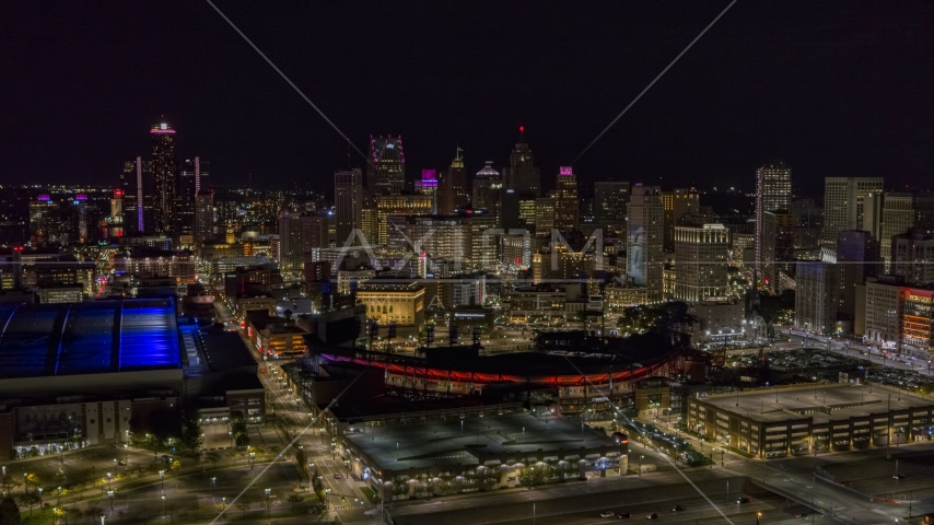 A wide view of the skyline and Comerica Park at night, Downtown Detroit, Michigan Aerial Stock Photo DXP002_193_0015 | Axiom Images