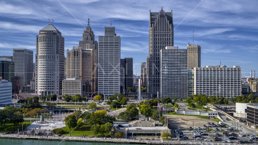 A view of towering skyscrapers across from Hart Plaza, Downtown Detroit, Michigan Aerial Stock Photo DXP002_196_0002 | Axiom Images