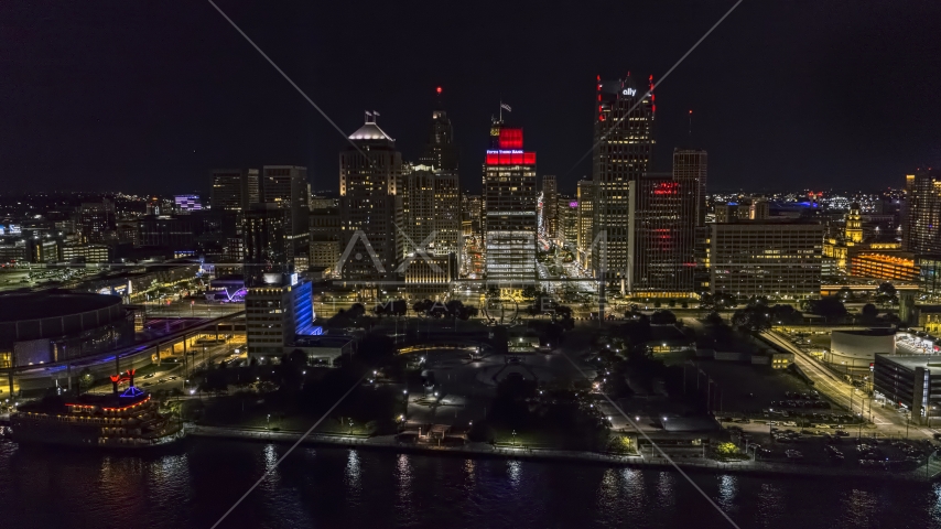 Hart Plaza and towering skyscrapers at night, Downtown Detroit, Michigan Aerial Stock Photo DXP002_199_0003 | Axiom Images