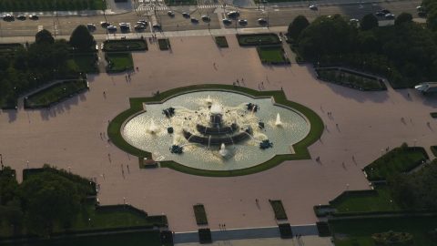 AX0001_097.0000113F - Aerial stock photo of Buckingham Fountain in Grant Park, Chicago, Illinois