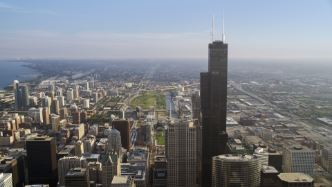 AX0001_107.0000311F - Aerial stock photo of A view of Willis Tower on a hazy day in Downtown Chicago, Illinois