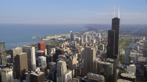 AX0001_108.0000249F - Aerial stock photo of Willis Tower and Lake Michigan in the background, Downtown Chicago, Illinois
