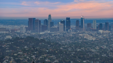 AX0158_005.0000601 - Aerial stock photo of Downtown Los Angeles skyline at twilight, California