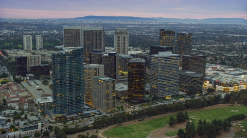 AX0158_024.0000157 - Aerial stock photo of Office buildings and skyscrapers at twilight, Century City, California