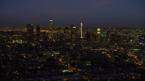 AX0158_072.0000199 - Aerial stock photo of The tall towers of the Downtown Los Angeles skyline, California at night