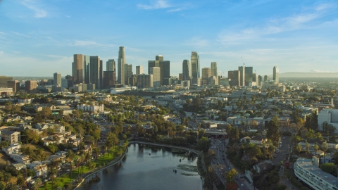 AX0162_001.0000318 - Aerial stock photo of The skyline of Downtown Los Angeles, California seen from Echo Park Lake