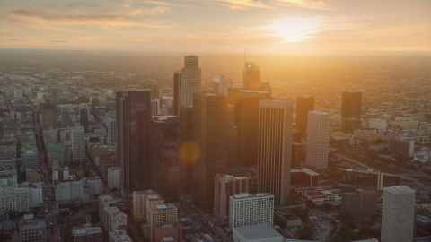 AX0162_086.0000142 - Aerial stock photo of The tall towers of downtown at sunset in Downtown Los Angeles, California