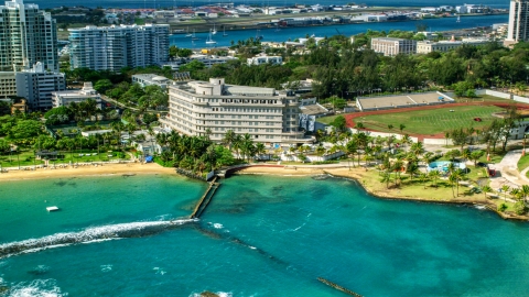 AX101_006.0000226F - Aerial stock photo of Waterfront Normandie Hotel in San Juan, Puerto Rico