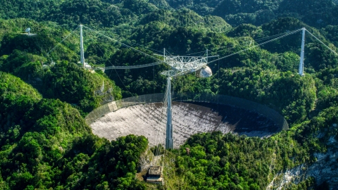 AX101_097.0000149F - Aerial stock photo of The Arecibo Observatory in Puerto Rico 