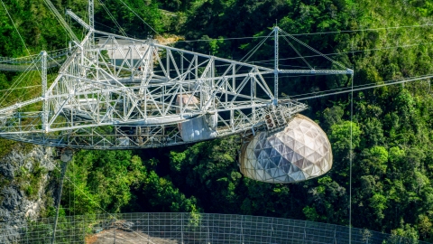 AX101_099.0000000F - Aerial stock photo of The top structure of the Arecibo Observatory, Puerto Rico 