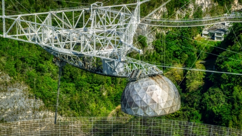 AX101_101.0000000F - Aerial stock photo of The telescope structure atop the Arecibo Observatory, Puerto Rico 