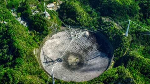 AX101_120.0000000F - Aerial stock photo of View of the Arecibo Observatory from above, Puerto Rico 