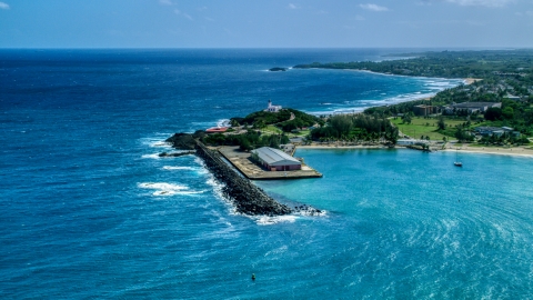 AX101_141.0000000F - Aerial stock photo of The Arecibo Lighthouse overlooking the blue Caribbean waters, Puerto Rico
