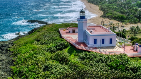 AX101_149.0000194F - Aerial stock photo of The Arecibo Lighthouse in Puerto Rico 