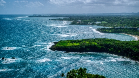 AX101_212.0000000F - Aerial stock photo of A Caribbean island coast in Vega Alta, Puerto Rico 