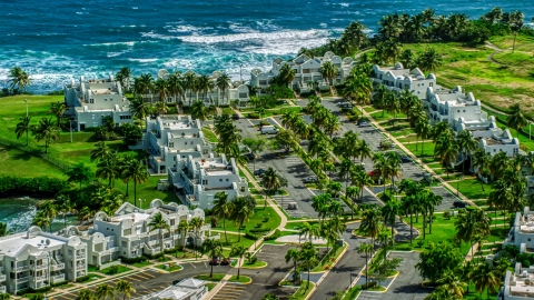 AX101_218.0000281F - Aerial stock photo of Caribbean island condominium complex in Dorado, Puerto Rico 