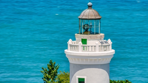 AX102_069.0000175F - Aerial stock photo of The tower of Cape San Juan Light, Puerto Rico 