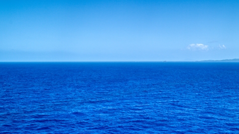 AX102_094.0000000F - Aerial stock photo of Sapphire ocean waters of the Atlantic Ocean 