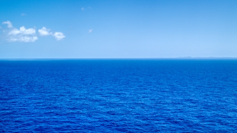 AX102_096.0000000F - Aerial stock photo of Sapphire blue ocean waters of the Atlantic Ocean 