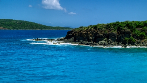 AX102_126.0000000F - Aerial stock photo of Sapphire blue waters and a rugged island coast in Culebra, Puerto Rico