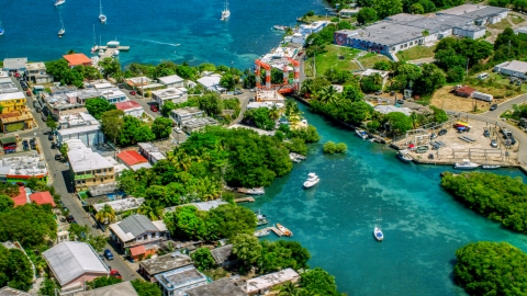 AX102_146.0000302F - Aerial stock photo of Coastal town with a small bridge in Culebra, Puerto Rico 