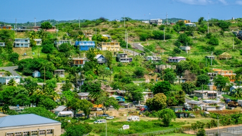 AX102_165.0000225F - Aerial stock photo of Hillside homes on the Caribbean island of Culebra, Puerto Rico 