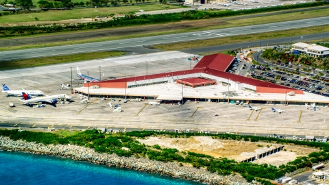 AX102_197.0000000F - Aerial stock photo of The main airport terminal at Cyril E King Airport, St. Thomas, US Virgin Islands