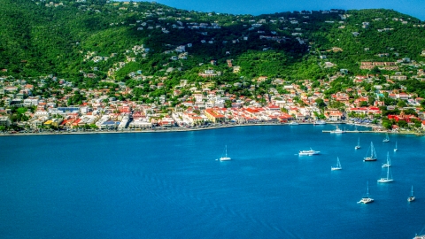 AX102_208.0000276F - Aerial stock photo of Green hills and the island town of Charlotte Amalie, St. Thomas, US Virgin Islands