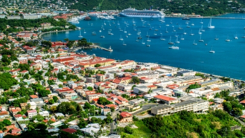 AX102_219.0000000F - Aerial stock photo of Caribbean island town with sailboats in the harbor, Charlotte Amalie, St Thomas 