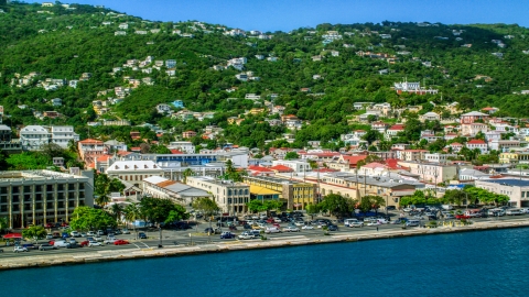 AX102_228.0000000F - Aerial stock photo of Buildings on the harbor shore in the Caribbean island to of Charlotte Amalie, St Thomas, US Virgin Islands 