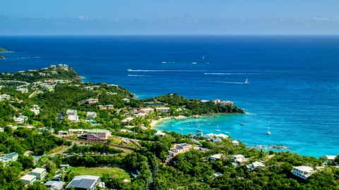 AX102_245.0000000F - Aerial stock photo of Secret Harbor Beach Resort overlooking turquoise Caribbean waters, St Thomas, US Virgin Islands