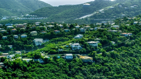 AX102_260.0000159F - Aerial stock photo of Hilltop homes and trees, East End, St Thomas, the US Virgin Islands 