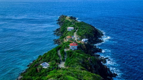AX102_277.0000000F - Aerial stock photo of Upscale hilltop homes on a Caribbean island, Magens Bay, St Thomas 