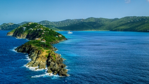 AX102_279.0000282F - Aerial stock photo of Picara Point and the crystal blue water in Magens Bay, St Thomas, USVI