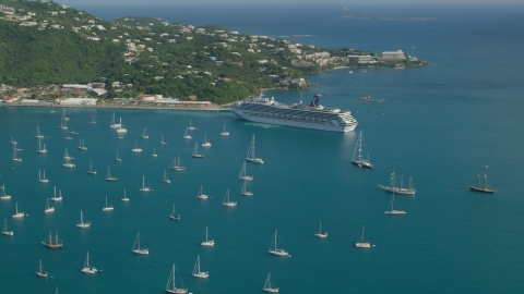 AX103_005.0000000F - Aerial stock photo of Cruise ship and sailboats in turquoise blue Caribbean waters, Charlotte Amalie, St Thomas
