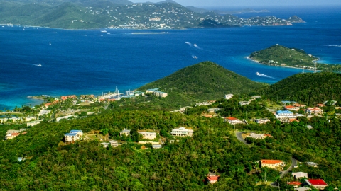 AX103_013.0000034F - Aerial stock photo of Caribbean resorts beside sapphire blue waters, East End, St Thomas