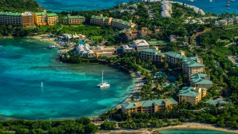 AX103_015.0000319F - Aerial stock photo of The Ritz-Carlton and turquoise blue Caribbean waters, St Thomas