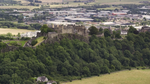 AX109_021.0000170F - Aerial stock photo of A view of historic Stirling Castle on a hill in Scotland