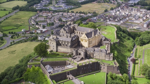 AX109_035.0000118F - Aerial stock photo of Historic Stirling Castle on a hill in Scotland